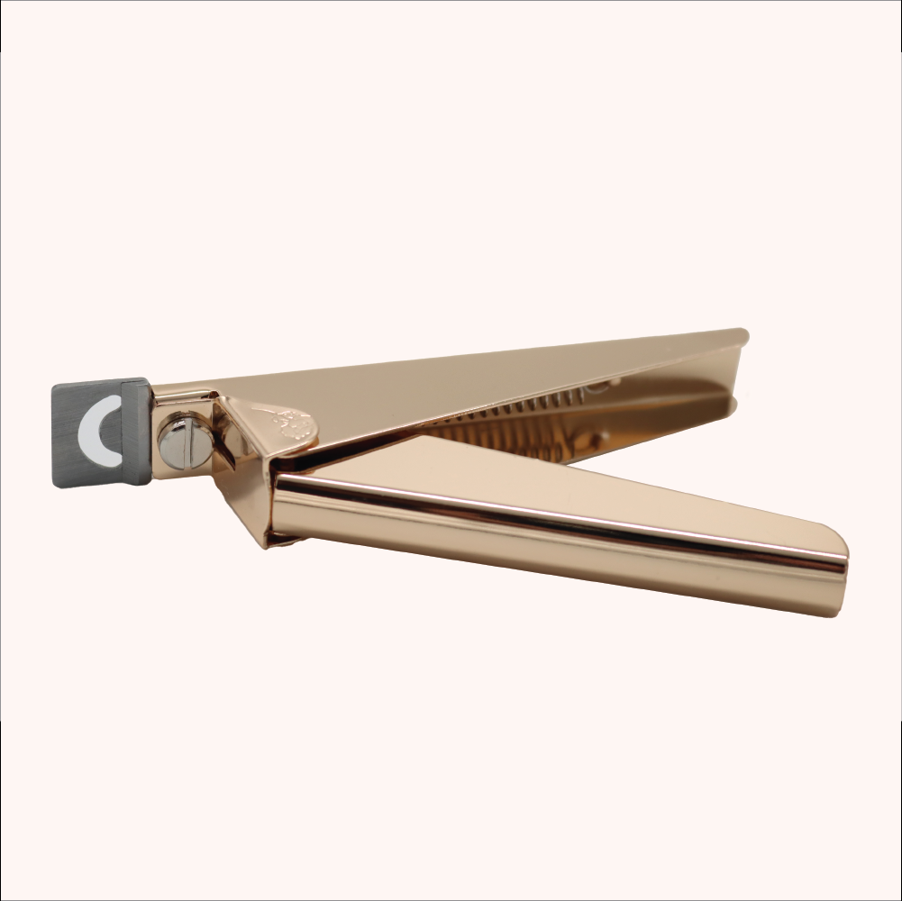 Coupe ongle pour capsules rosé